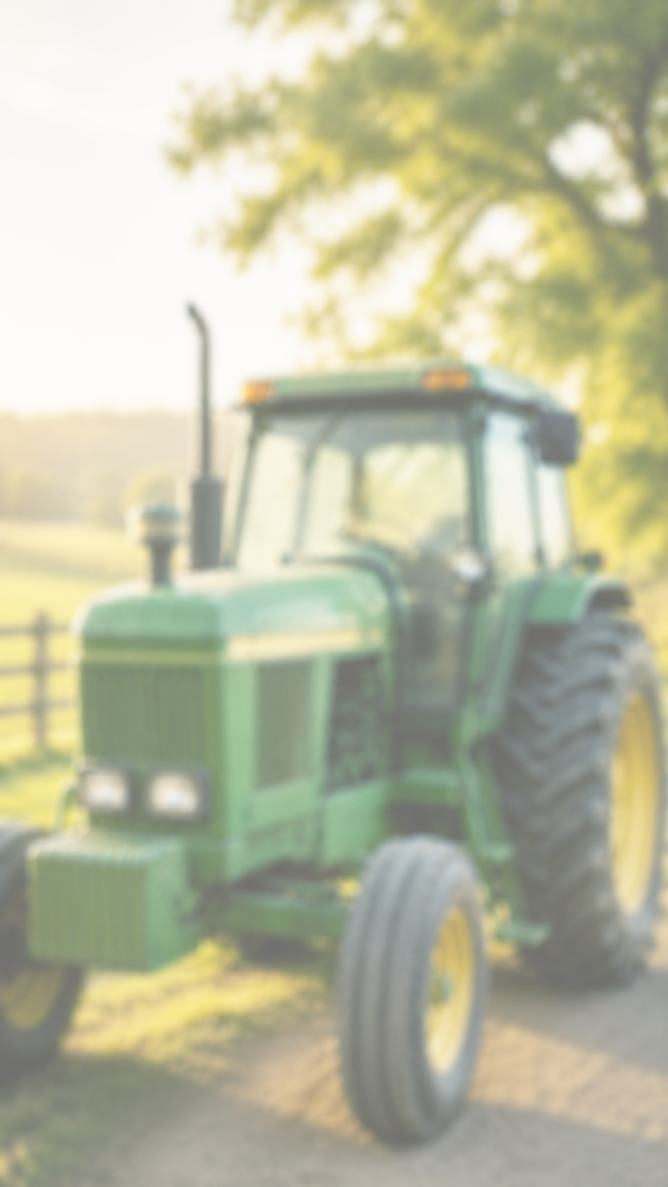 A john deer tractor in the background of O My! Goat Milk Pumice Soap perfect for keeping farmers and gardeners hands clean and soft after a hard day of work.