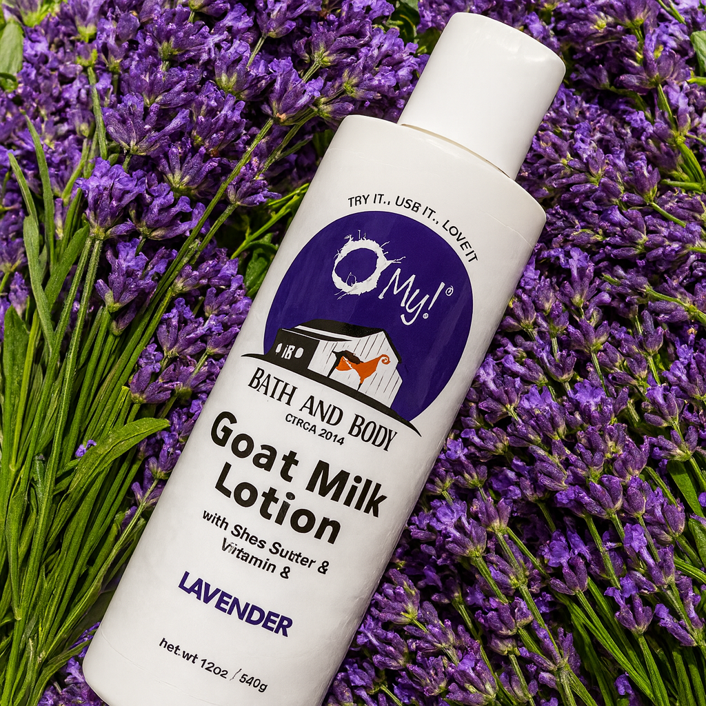 Bottle of O My! goat milk lotion with lavender scent on a bed of lavender flowers