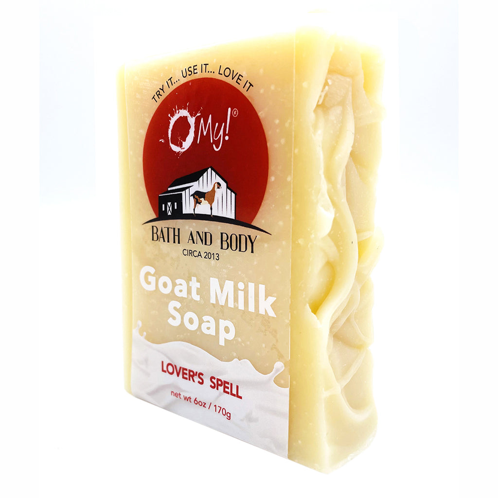 Bar of O My! goat milk soap with a clear label on a white background