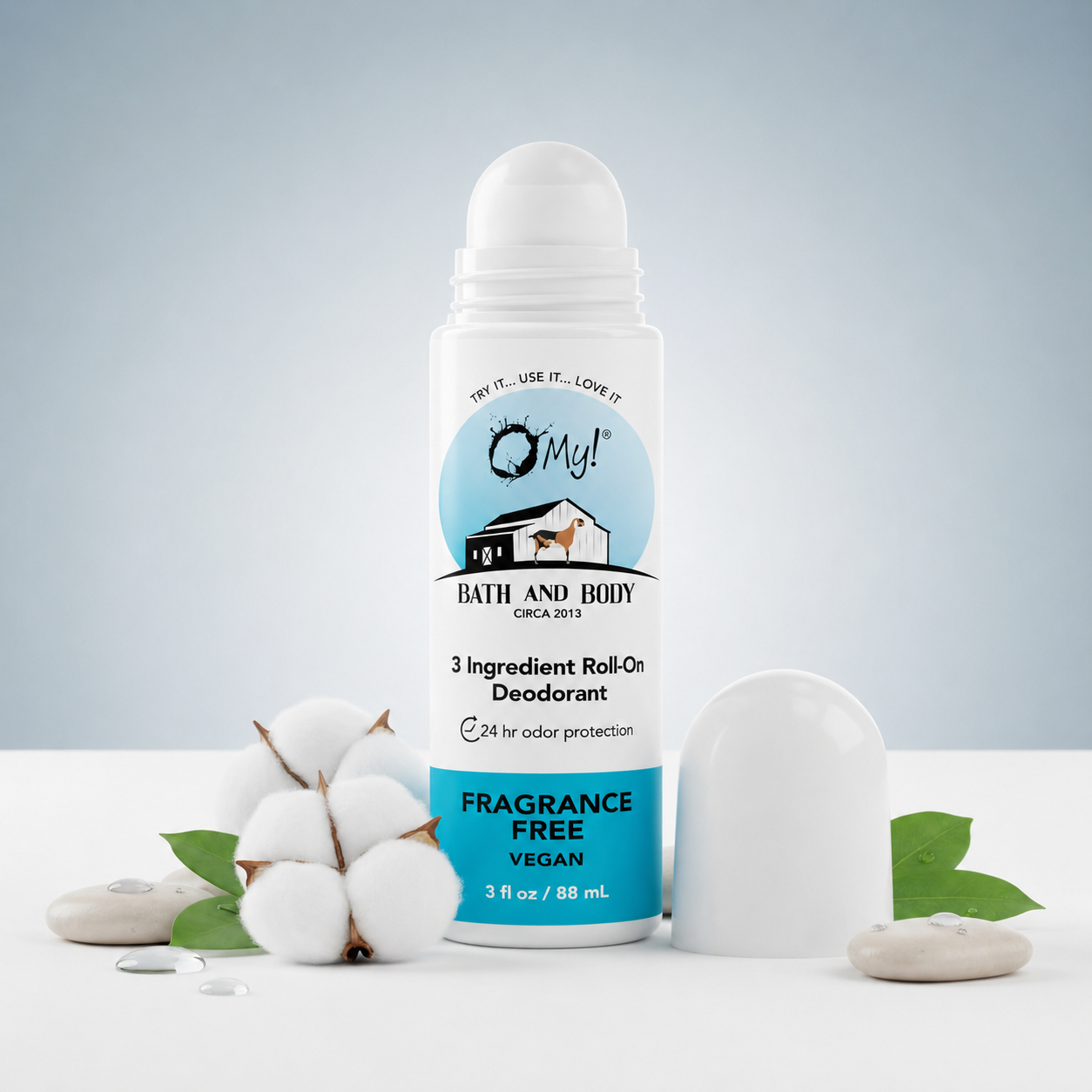 O My! Bath and Body 3 Ingredient Roll-On Deodorant on a white and light blue background with cotton and fragrance free elements.