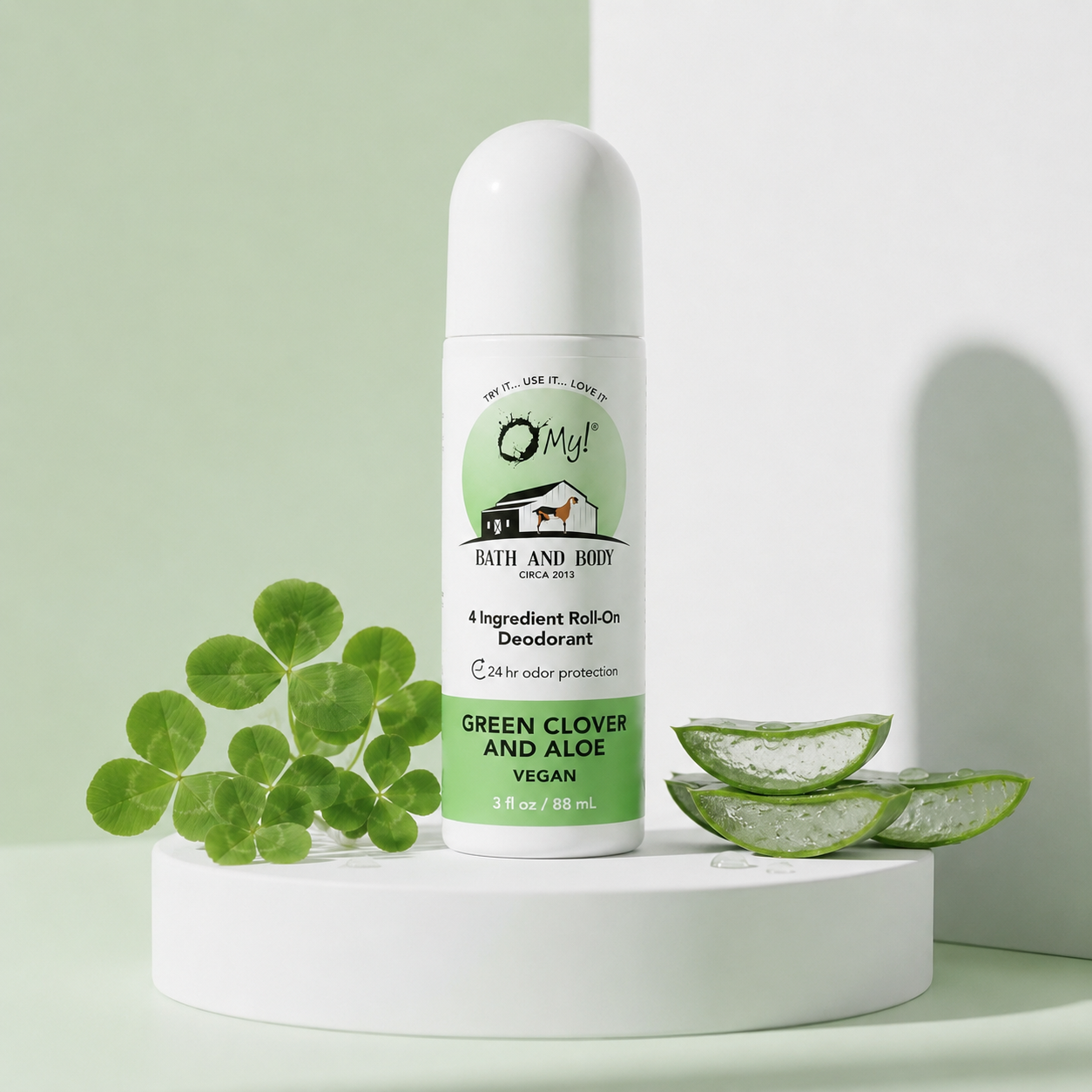 O My! 4 Ingredient Roll-on deodorant with green clover and aloe on a white pedestal against a light green background with clover and aloe elements.
