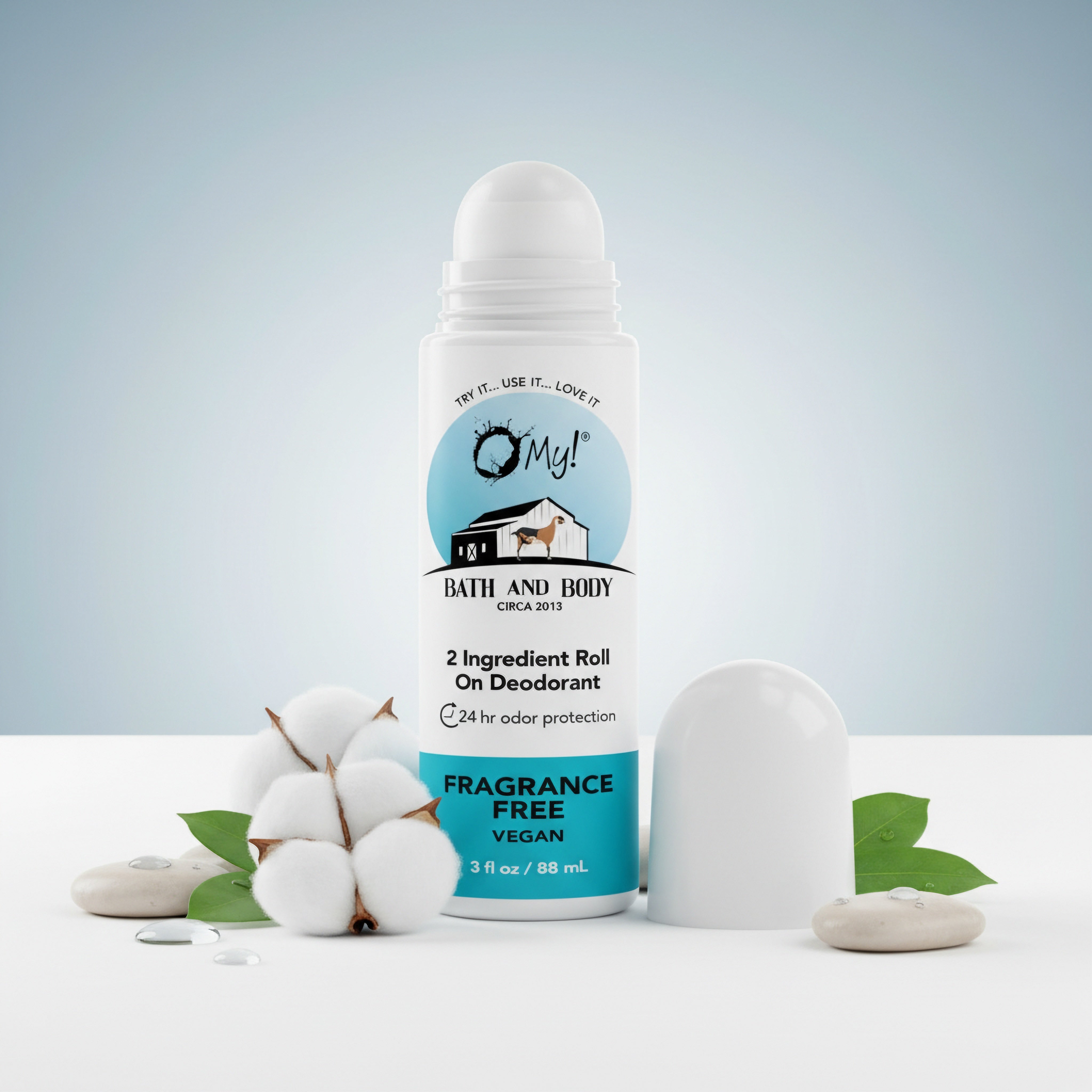 O My! Roll-on deodorant with cotton and mint leaves on a light gray background