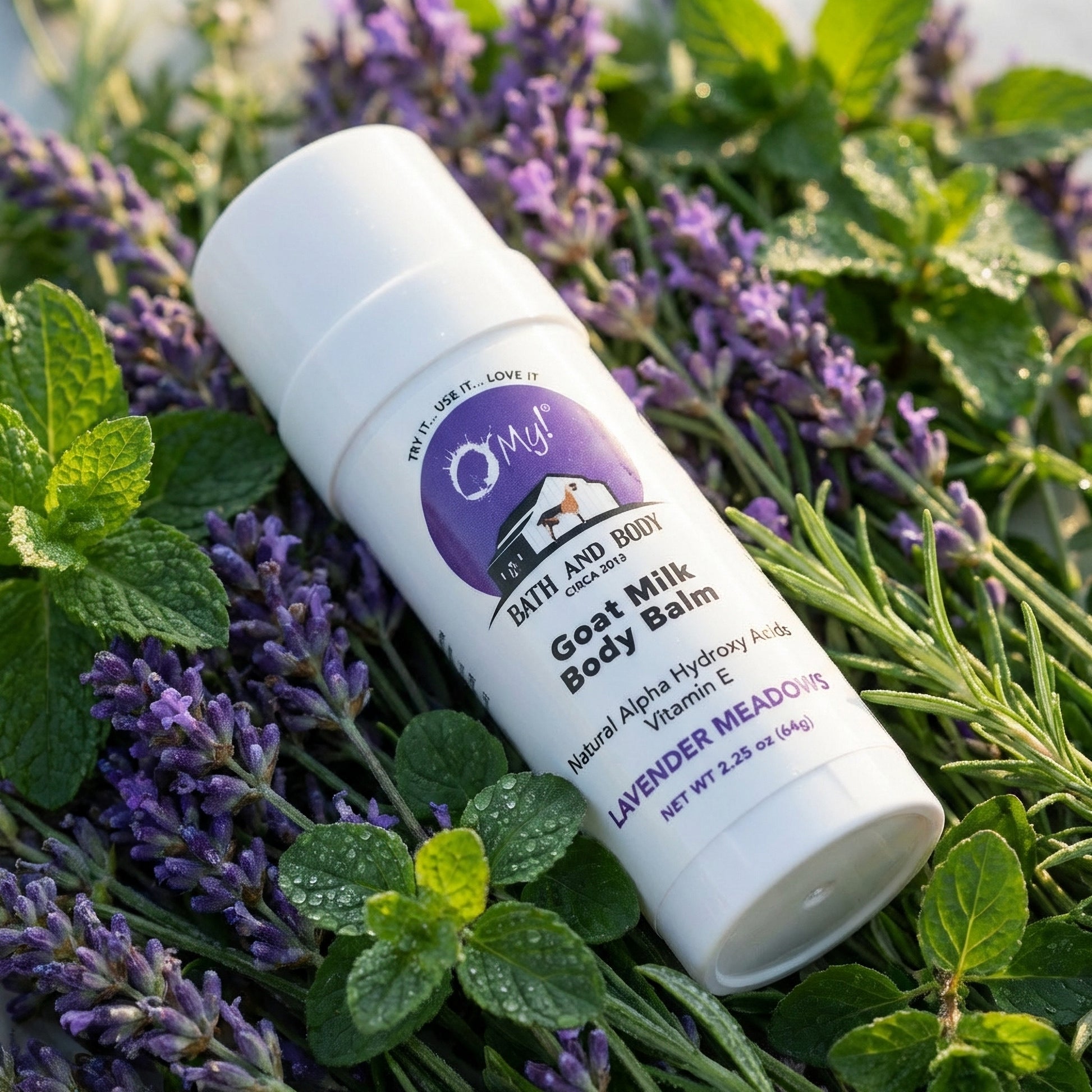 O My! Goat milk body balm Lavender Meadows twist tube with Lavender and green leaves.