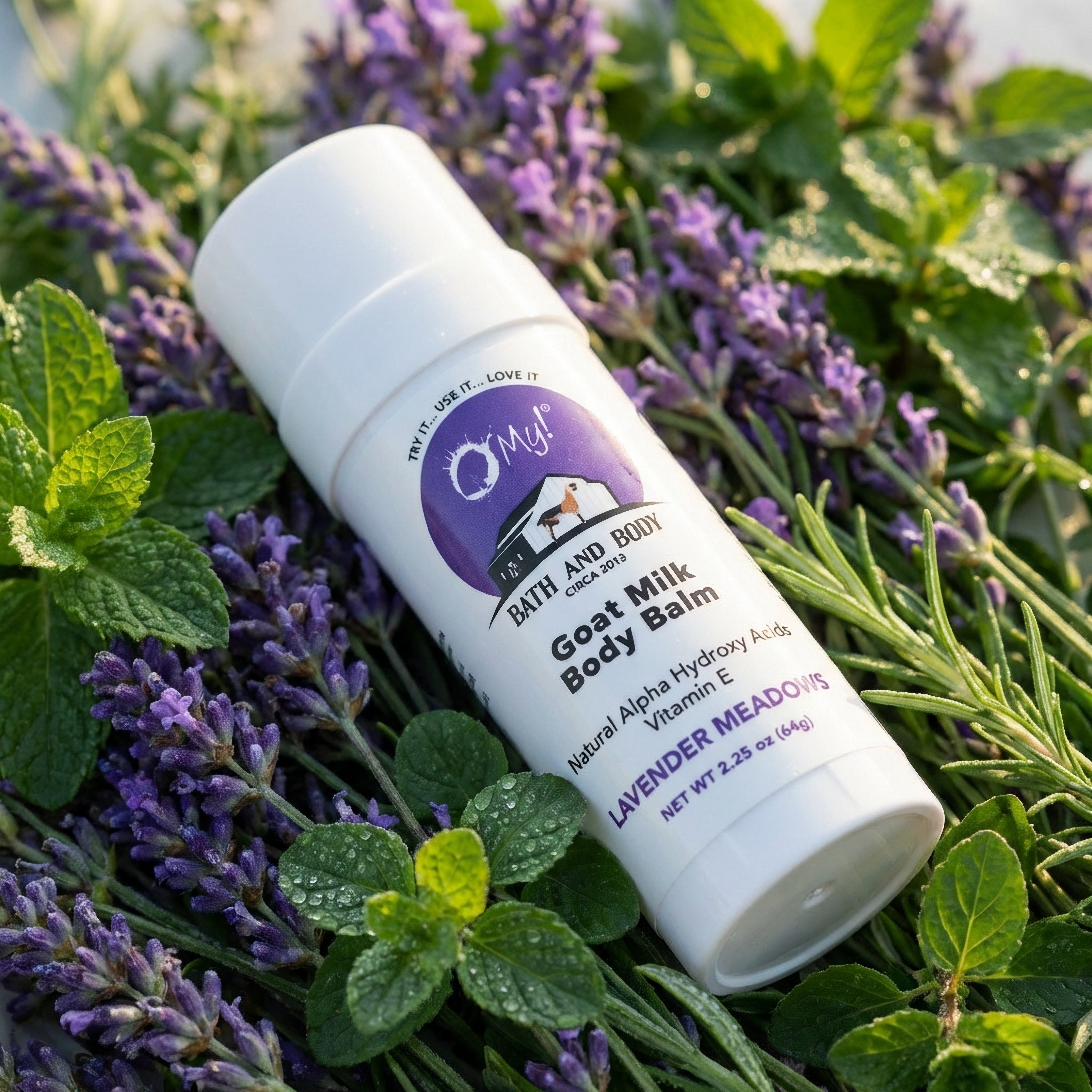 O My! Goat milk body balm Lavender Meadows twist tube with Lavender and green leaves.