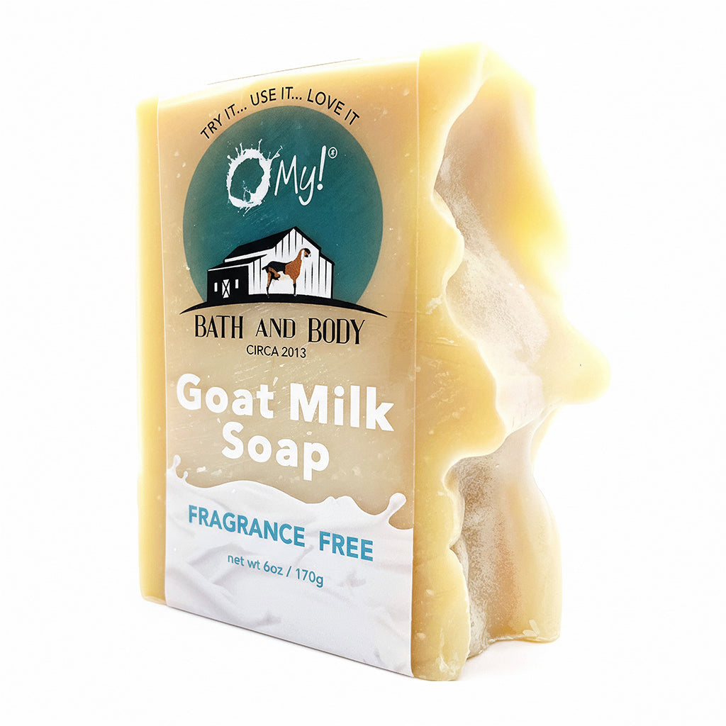 Bar of O My! goat milk soap with a clear label on a white background