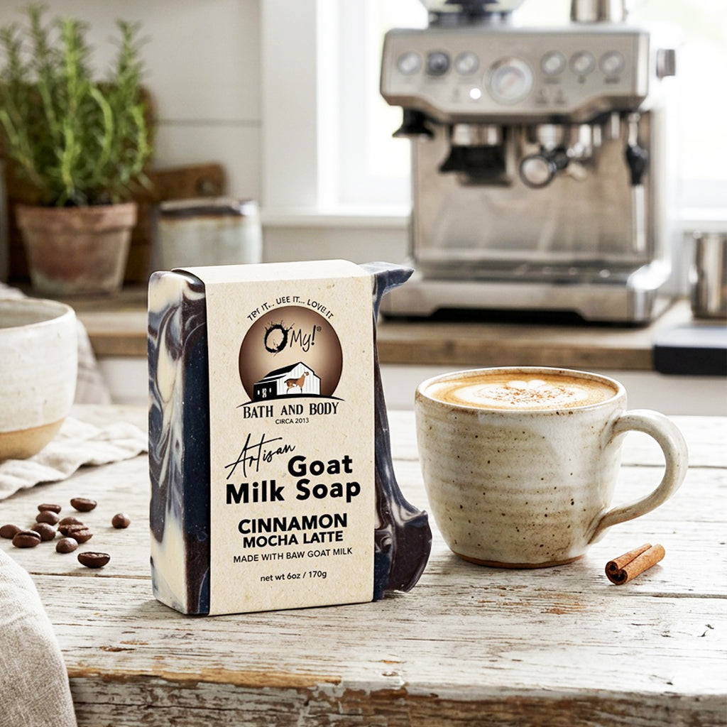 O My! Artisan Goat Milk Soap Bar Cinnamon Mocha Latte scent on a kitchen counter with a coffee cup and espresso machine.