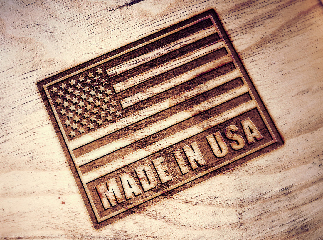 O My! Bath and Body is proudly made in Tennessee, USA.  Wooden plaque with American flag and 'Made in USA' text on a wooden surface