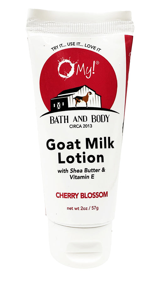 O My! Goat milk lotion Cherry Blossom tube with deep red pink and white label on a white background.